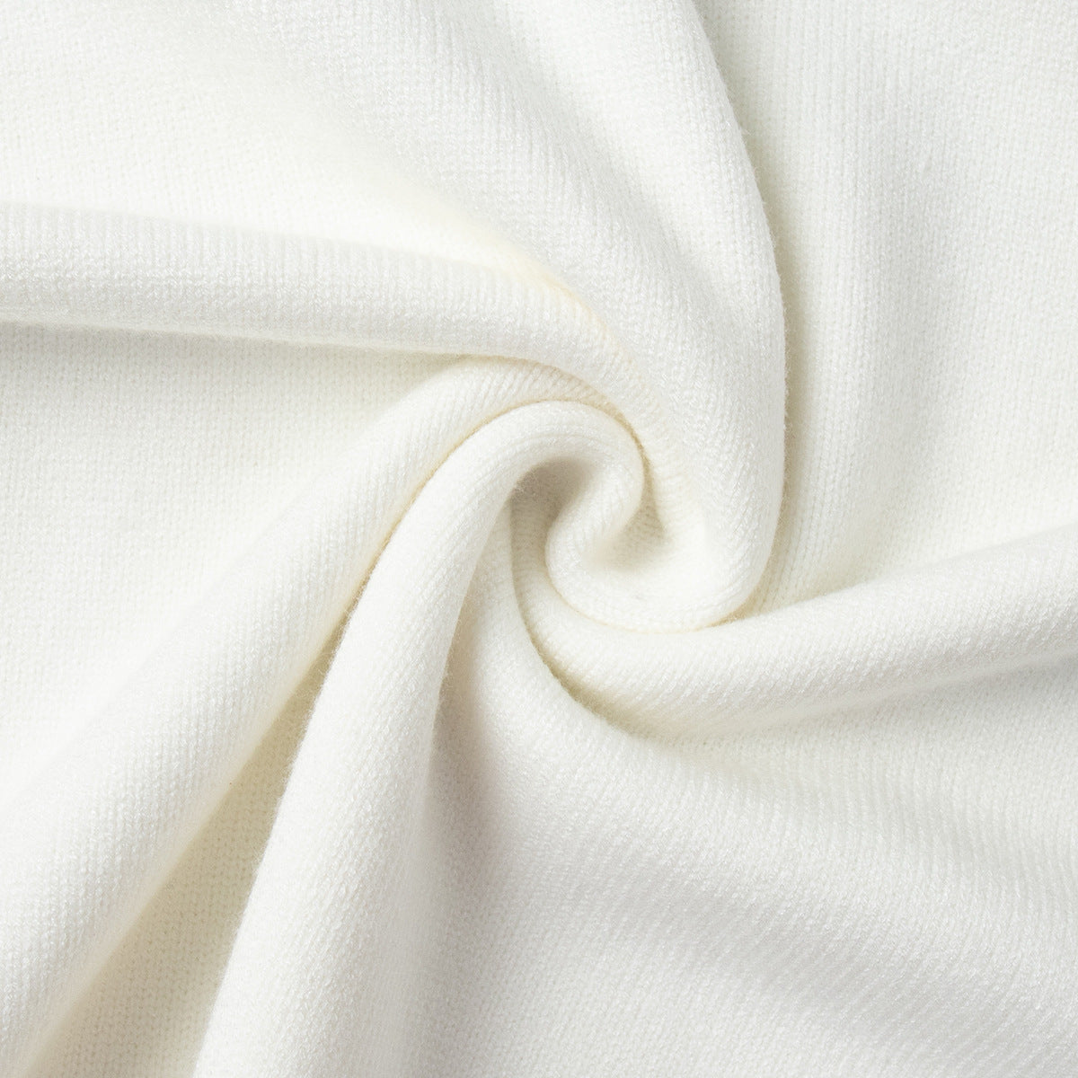 White knit round-neck sweater fabric close-up with ribbed texture