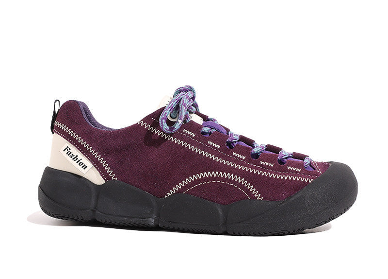 Purple platform hiking shoes with purple lace-up front and black thick sole