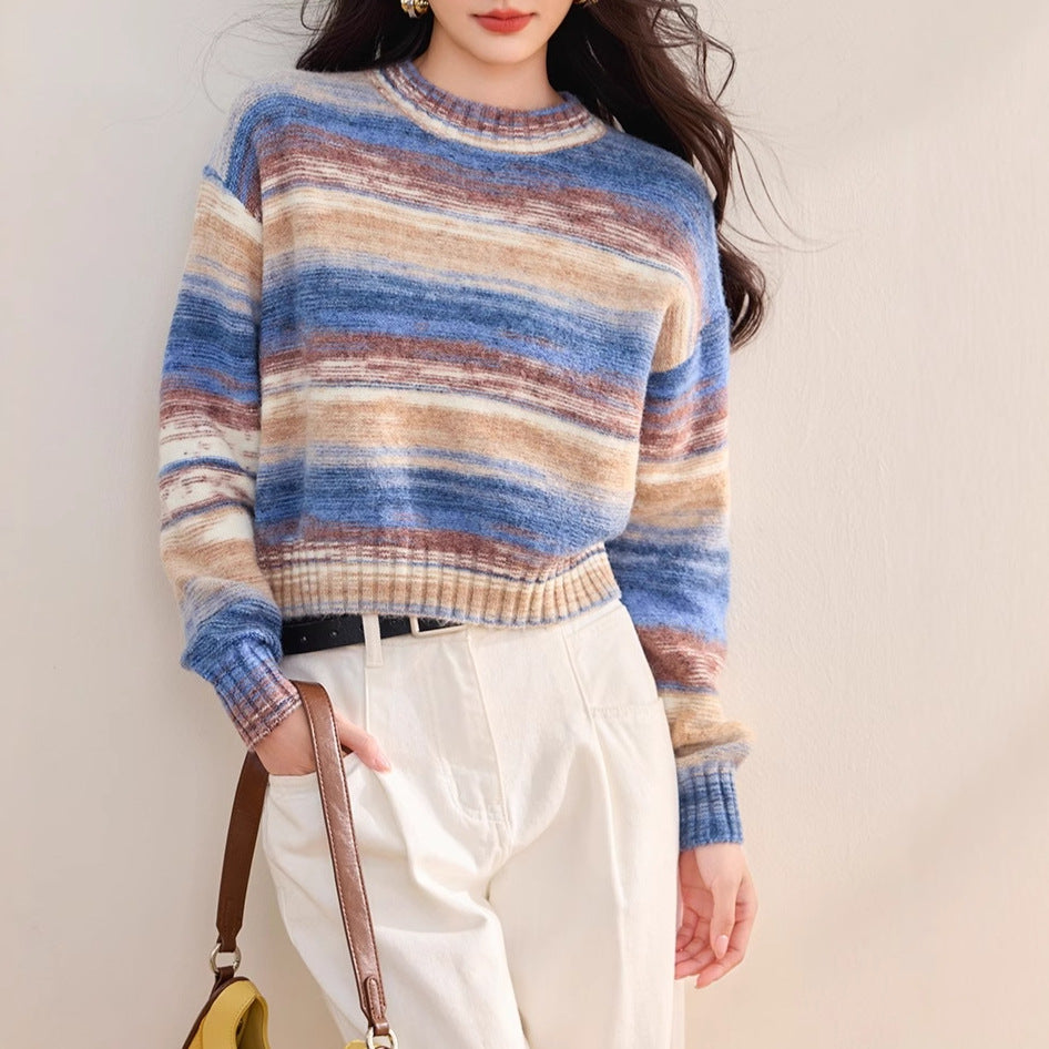 Women’s blue striped gradient knit sweater with round neck and long sleeves