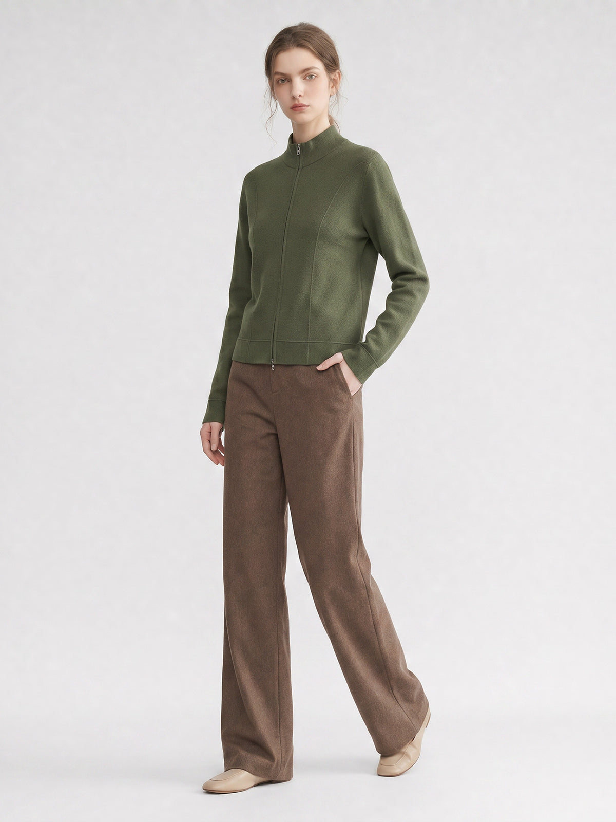 Women’s green knit cardigan with stand-up collar and front zipper