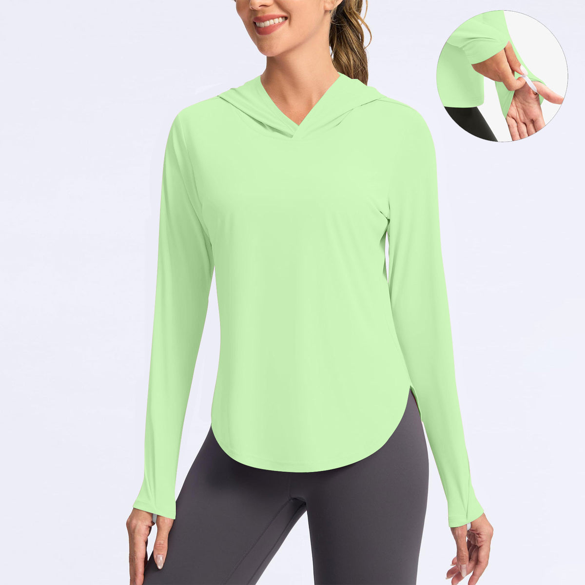 Women's hooded sun protection shirt, long-sleeve, green V-neck with hood