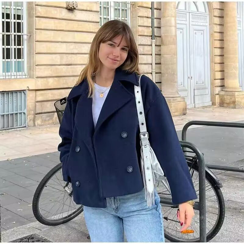 Navy double-breasted short wool jacket with notch lapels and button front