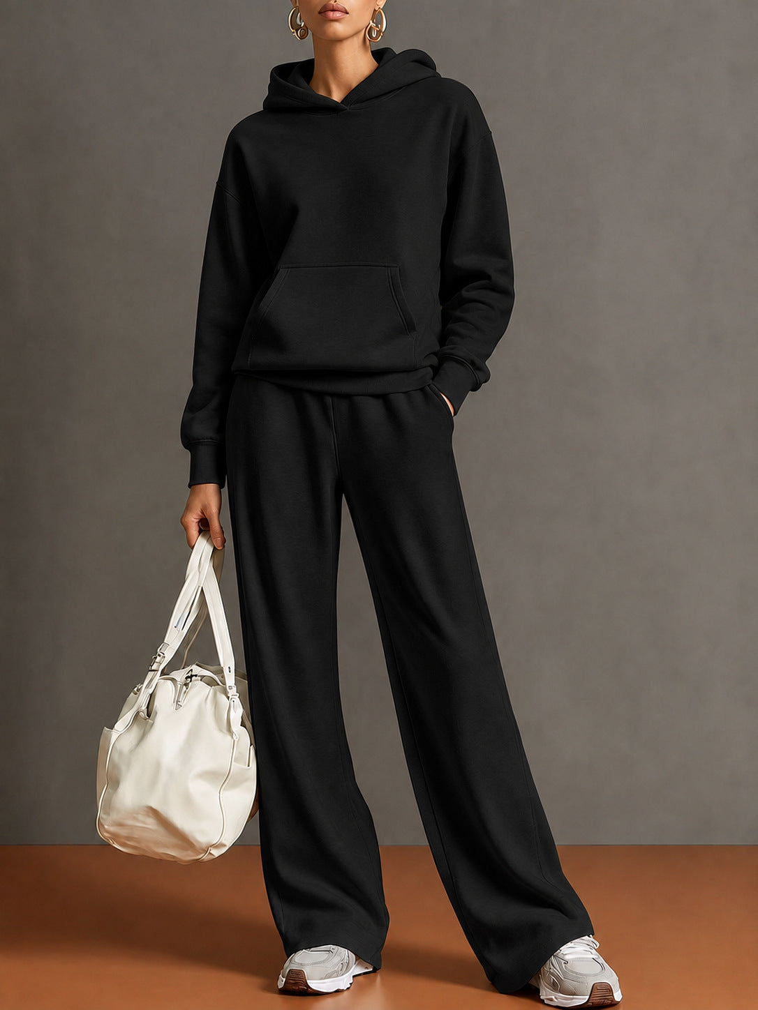 Women's hooded sweatshirt and wide-leg pants set, black, loose fit.
