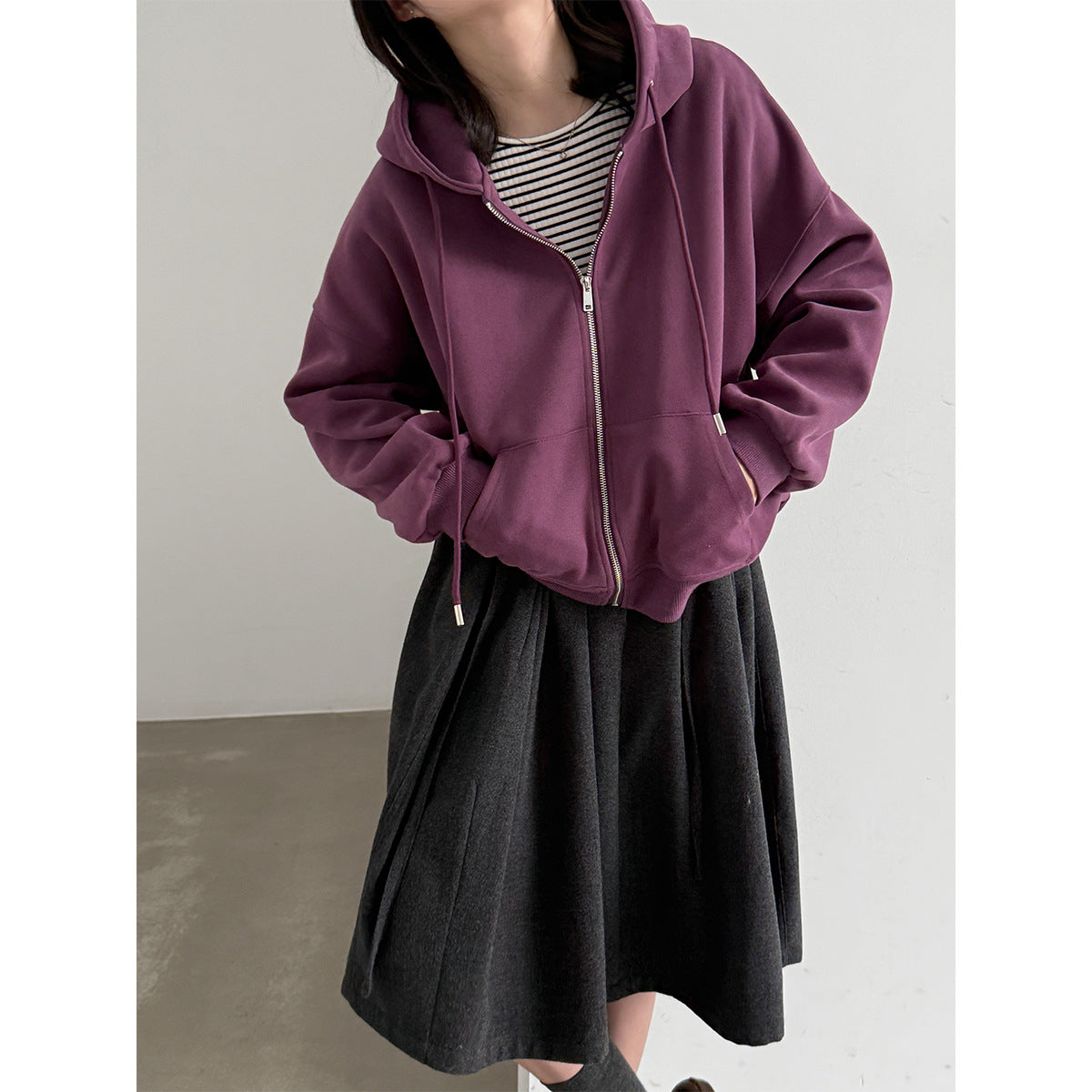 Women’s zip-up hooded sweatshirt in purple with drawstring hood and front zipper