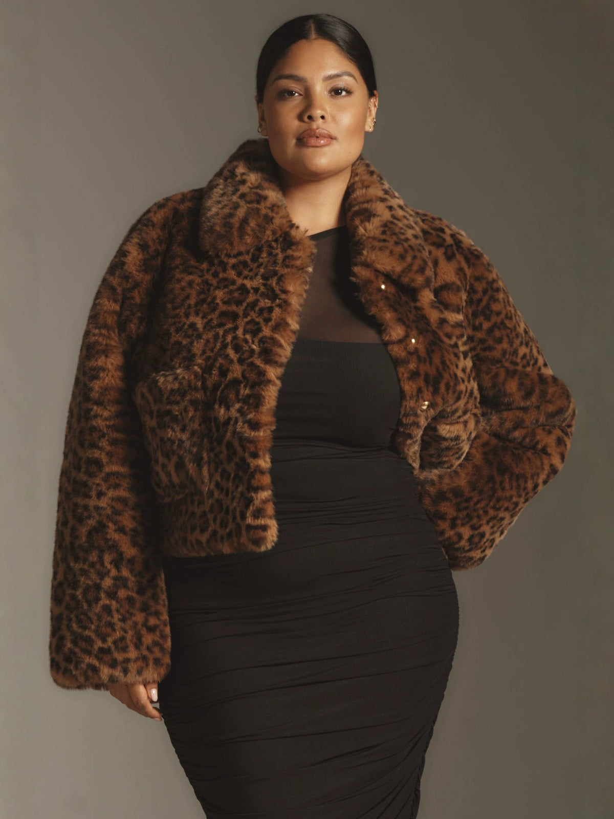 Leopard print faux fur short coat with lapel, worn over black dress