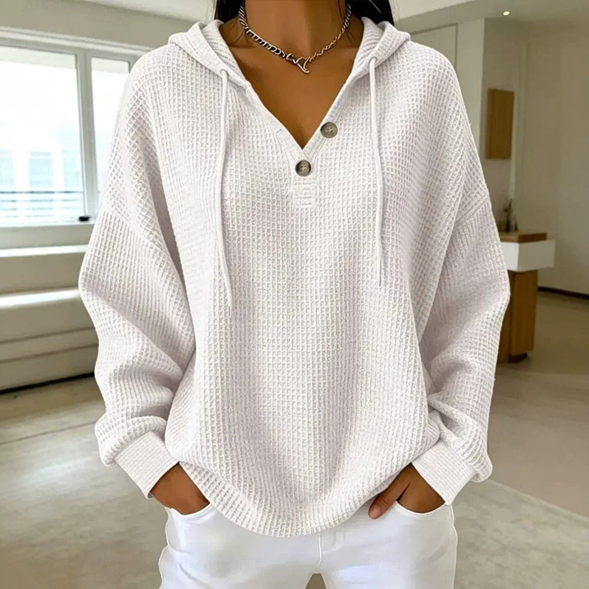 Women\u2019s waffle-knit drawstring hoodie with henley button placket, white hood and long sleeves