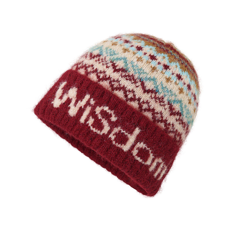 Red knit beanie with multicolor Fair Isle band and ribbed edge