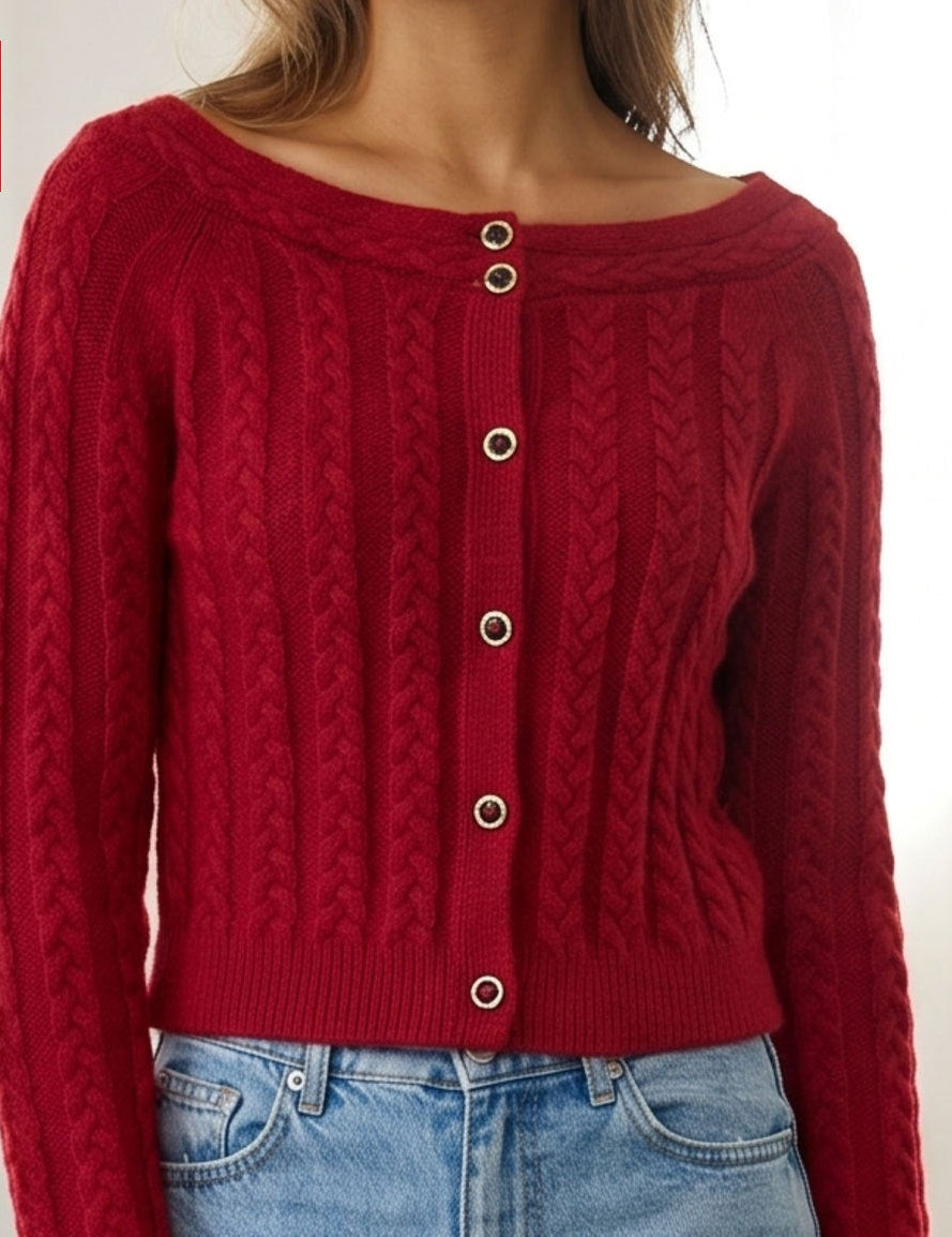 Women’s red cable knit cardigan close-up, round neck button placket