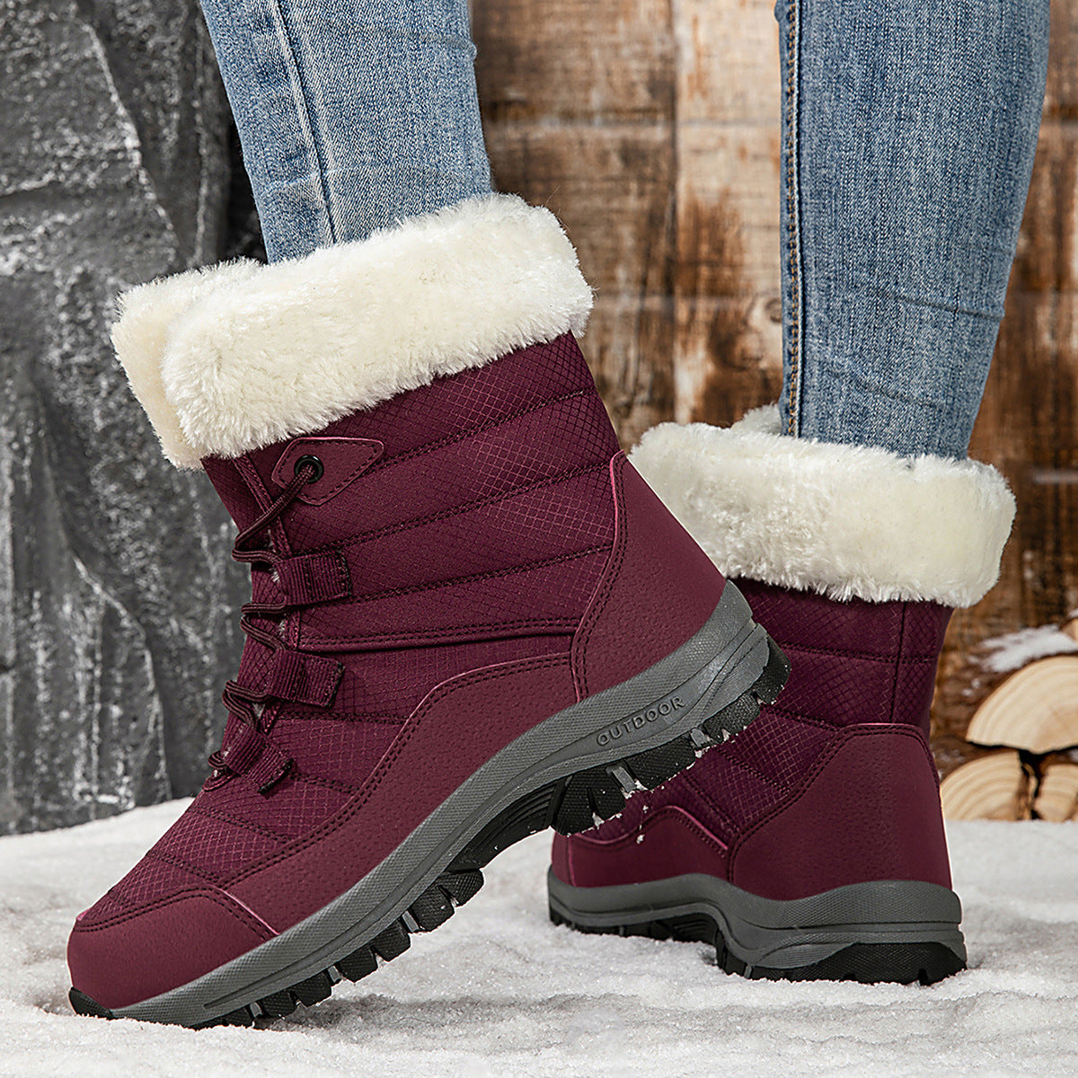 Women’s dark red mid-top winter snow boots, faux fur collar, lace-up with tread sole