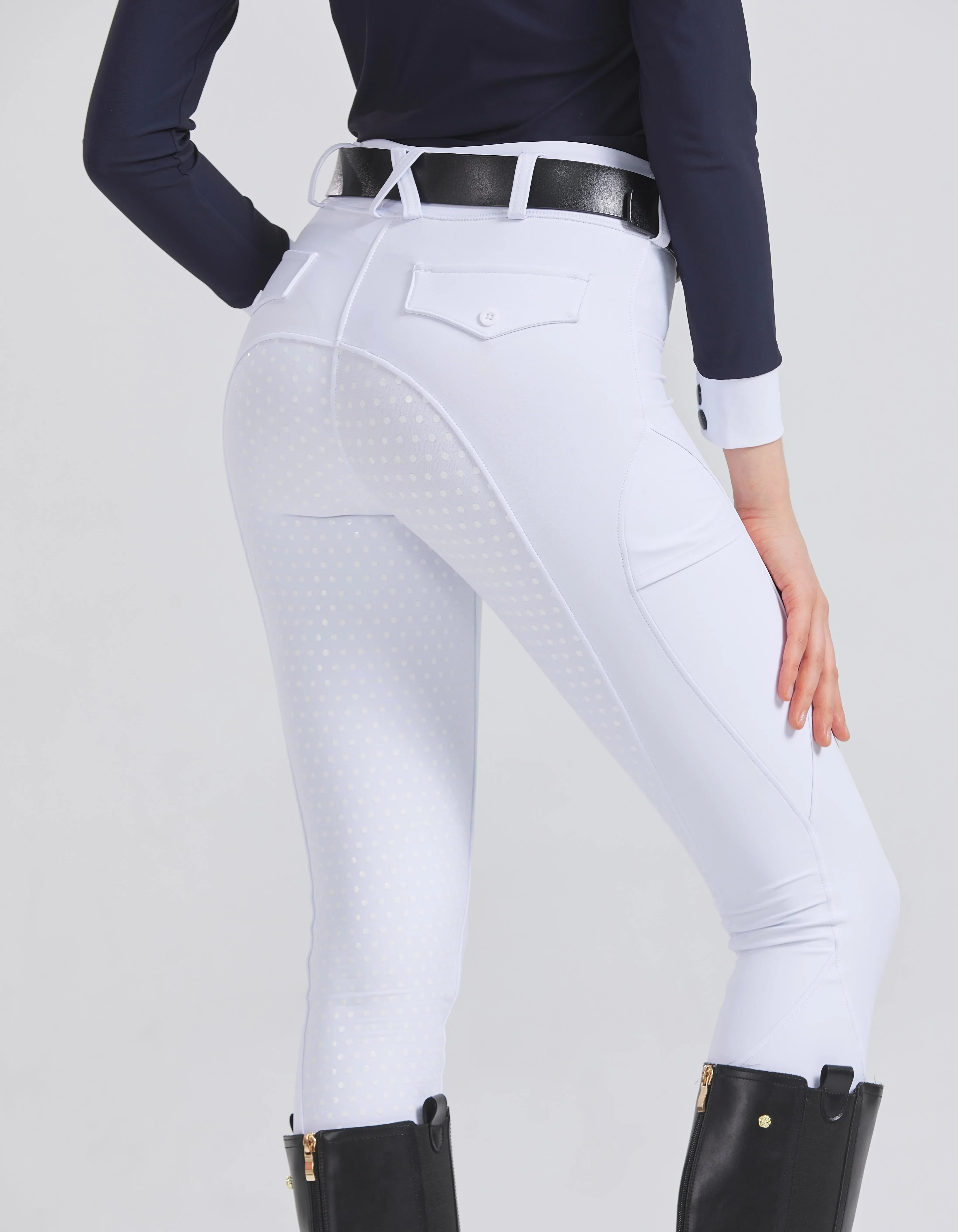 Women’s high-waist riding breeches in white with dotted grip panels on the thighs
