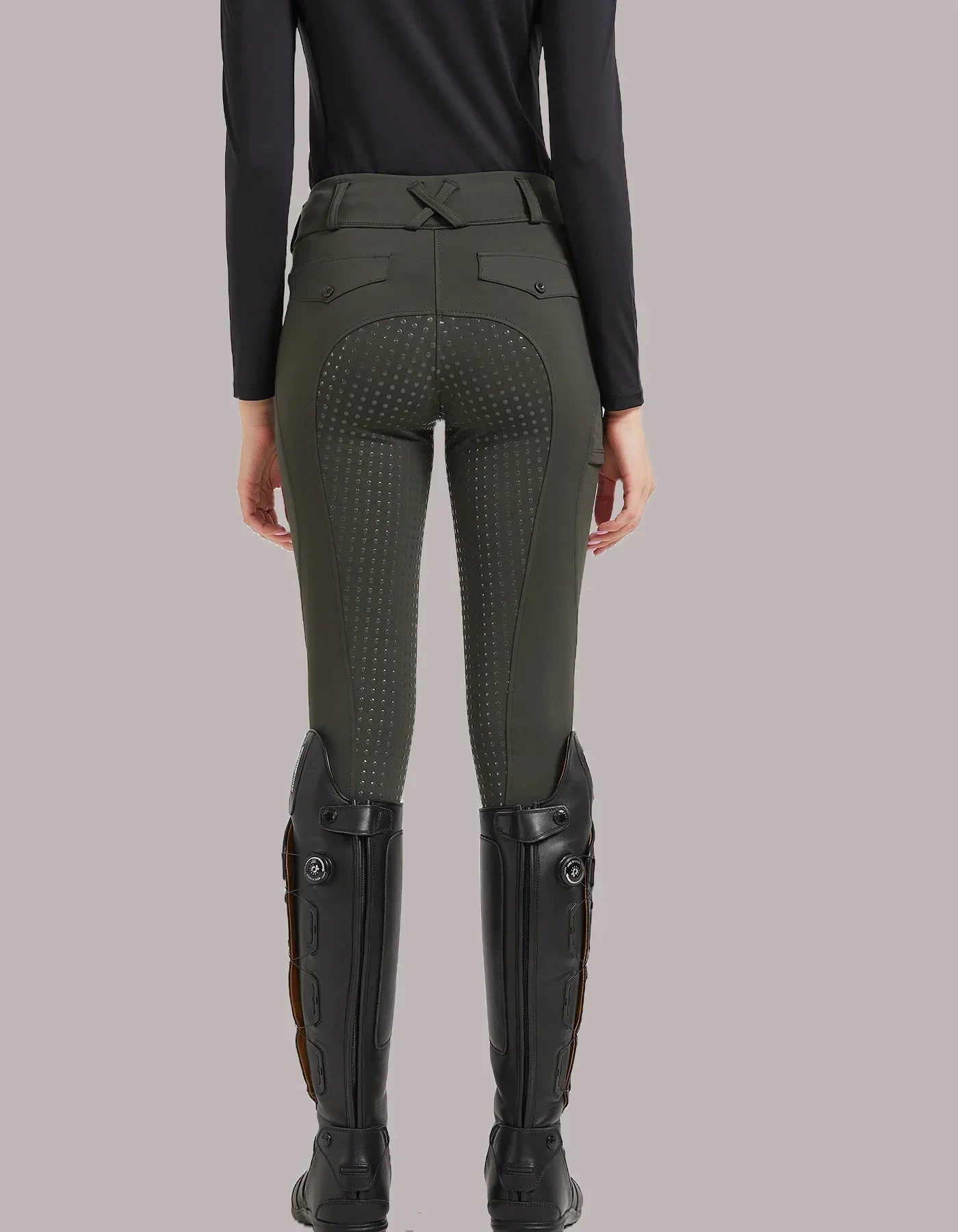 Women’s high-waist riding breeches in olive green with dotted grip panels and back pockets