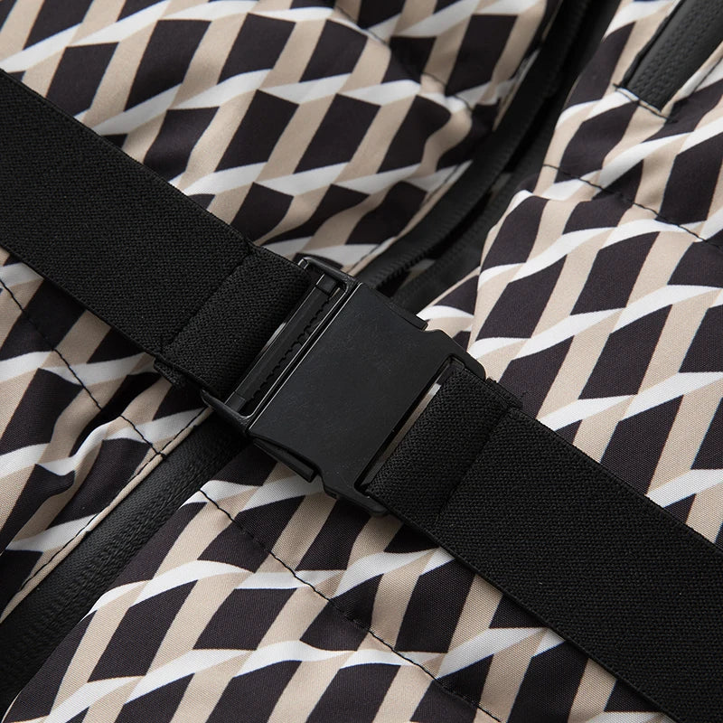Close-up of patterned parka's black waist belt and buckle