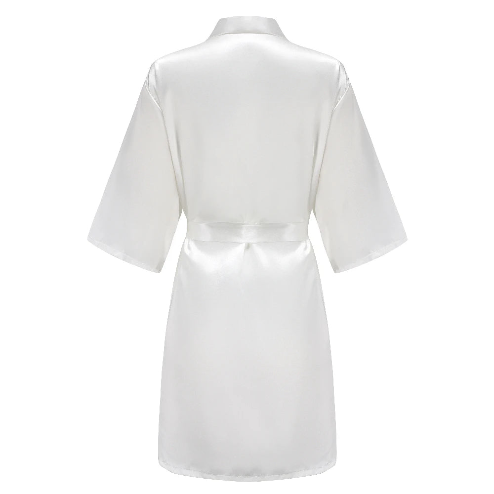Plain white satin robe with wide sleeves and a matching tie belt