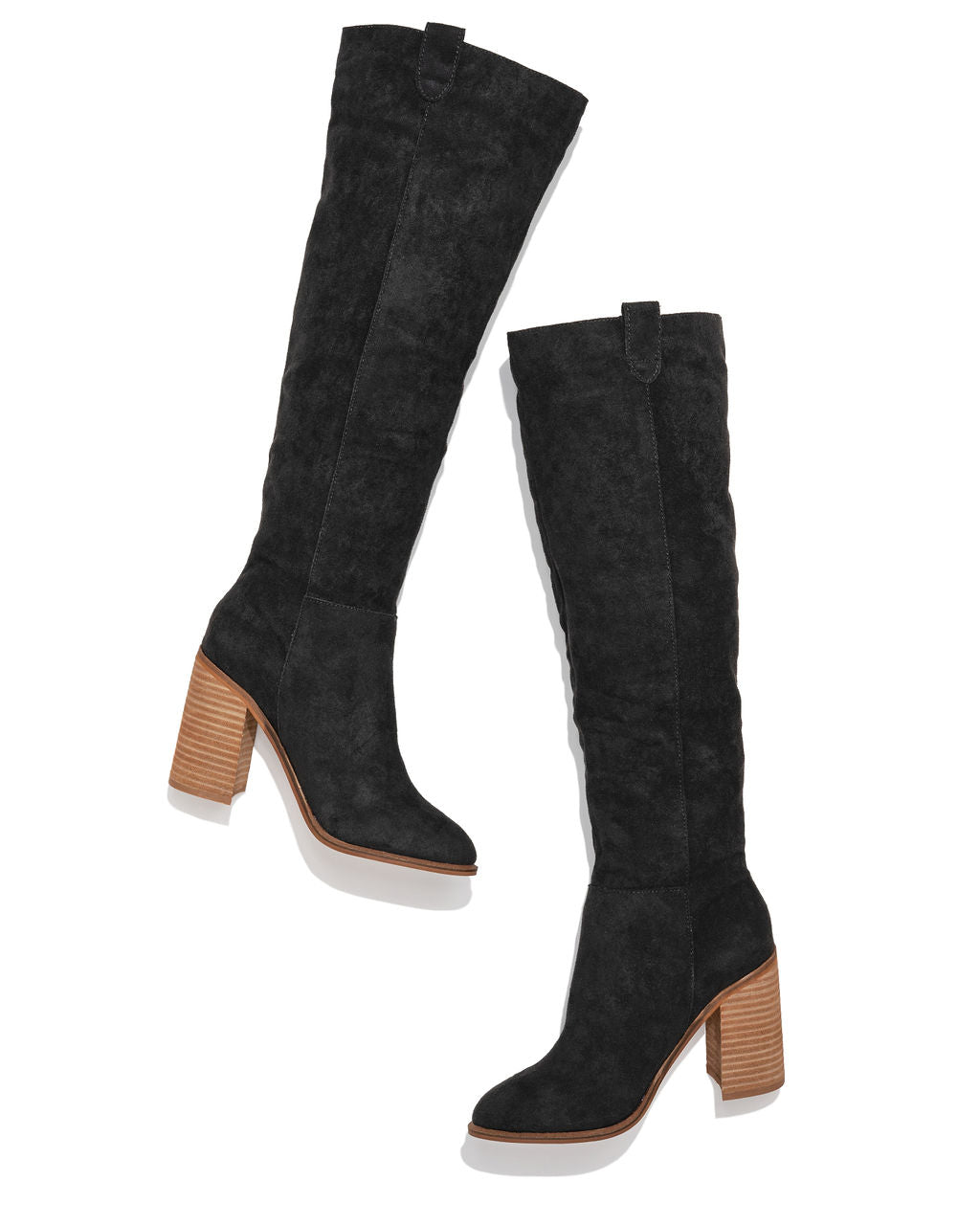 Pair of black slouch knee-high boots with stacked block heel