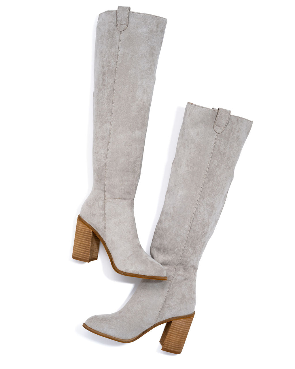 Pair of light grey slouch boots with tan sole and block heel