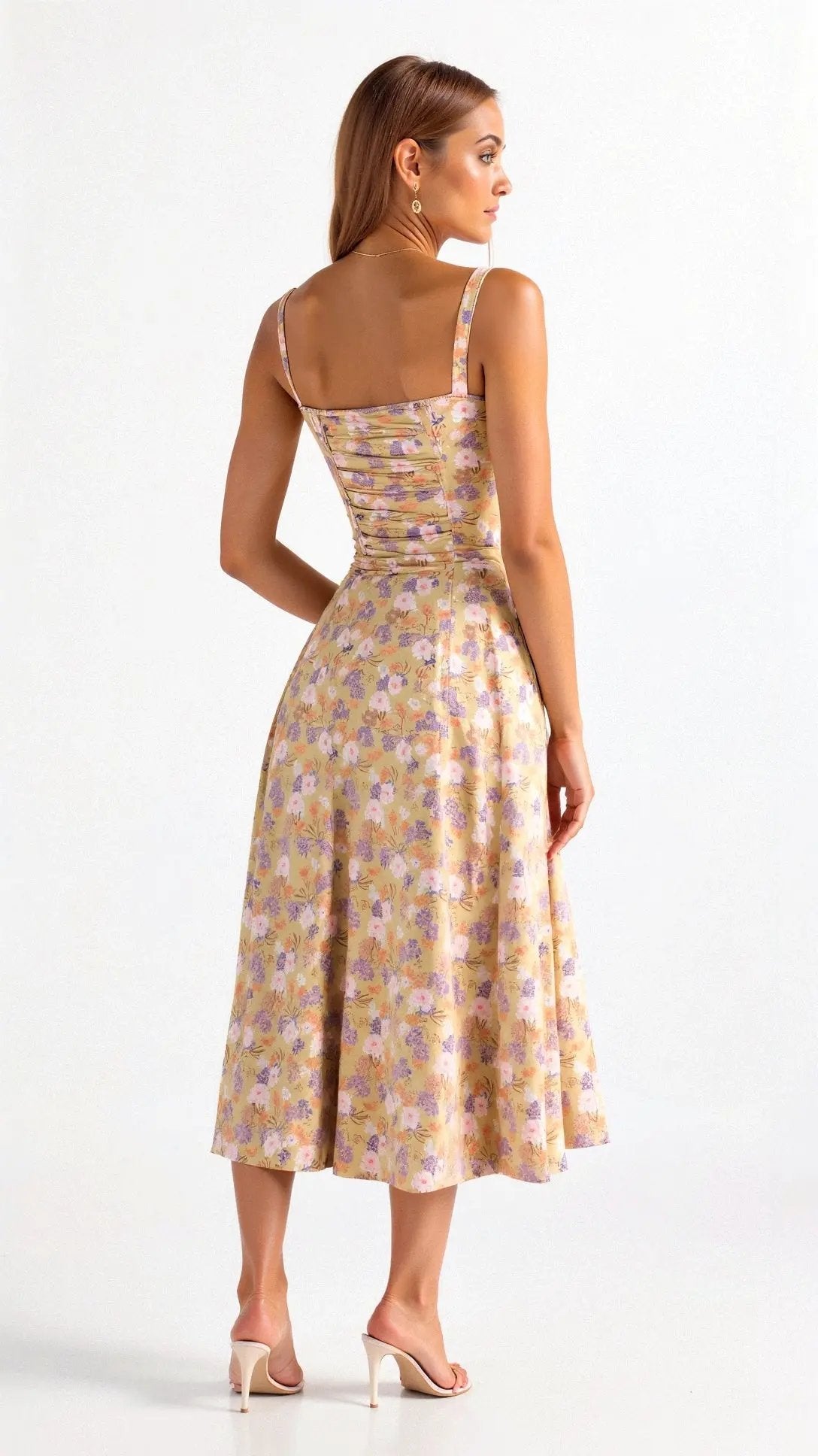 Yellow floral sleeveless midi dress with square neckline and backless-style strap detail