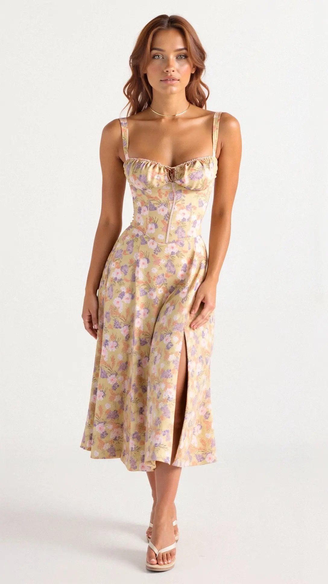 Yellow floral sleeveless midi dress with ruched sweetheart neckline and gathered skirt