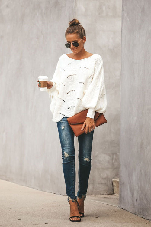 White oversized bat-wing knit sweater with arched stitch details