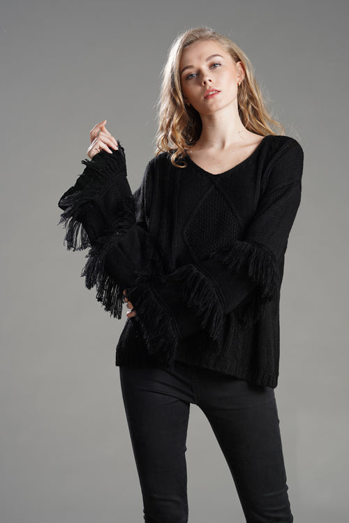 Black tassel knit sweater with diamond yoke and layered fringe sleeves