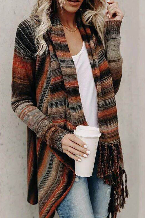 Tassel sweater coat in rust and dark stripe knit with open front and fringe hem