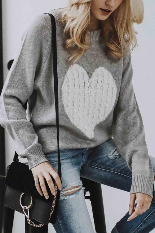 Grey knit sweater with white heart cable-knit front, crew neck, long sleeves
