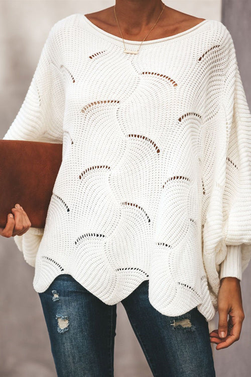 White oversized knit sweater featuring dotted arched pattern