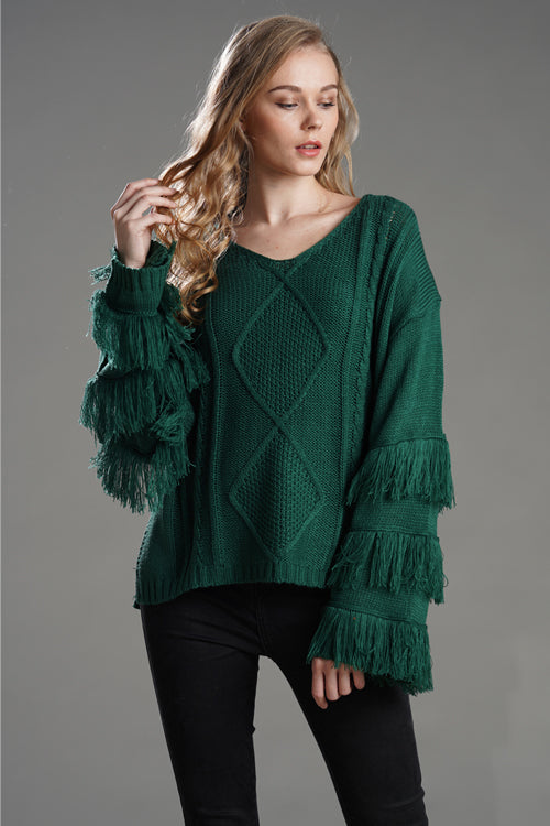 Green tassel knit sweater with V-neck and fringe cuffs, textured diamond panel