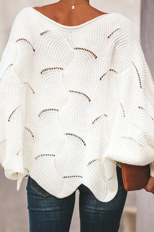 White oversized bat-wing knit sweater with arched dotted pattern
