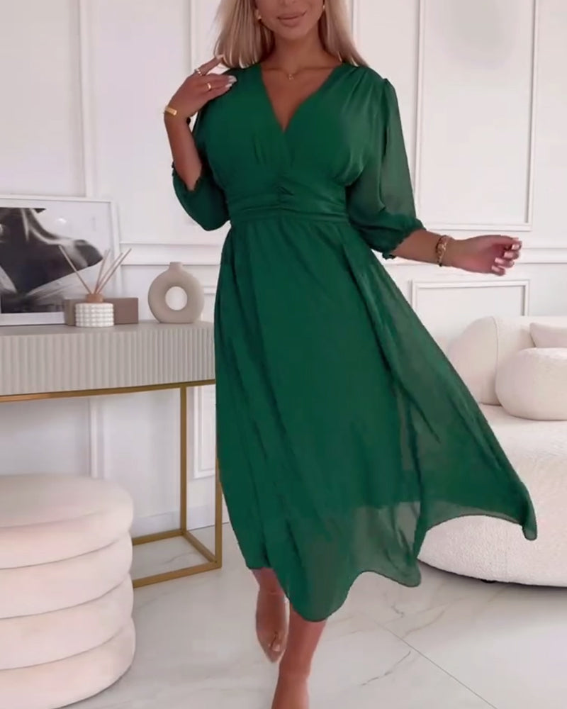Green chiffon midi dress with V-neck and ruched waist, flowy puff sleeves