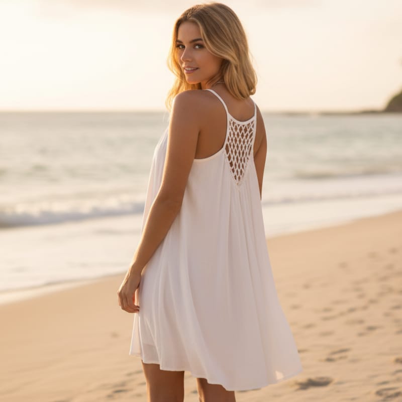White chiffon mini dress, spaghetti straps, openwork cutout back