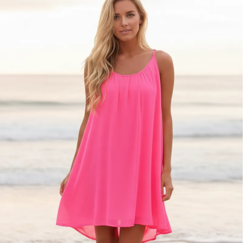 Pink chiffon mini dress with spaghetti straps and flowy flare skirt