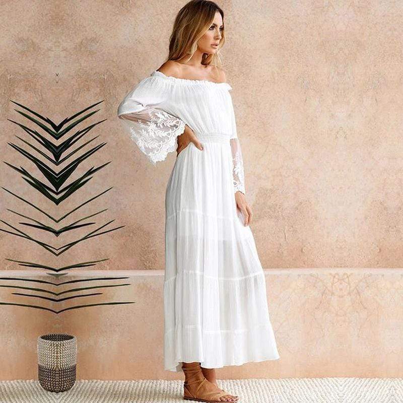 White off-shoulder cotton maxi dress with lace sleeves and layered tiered skirt