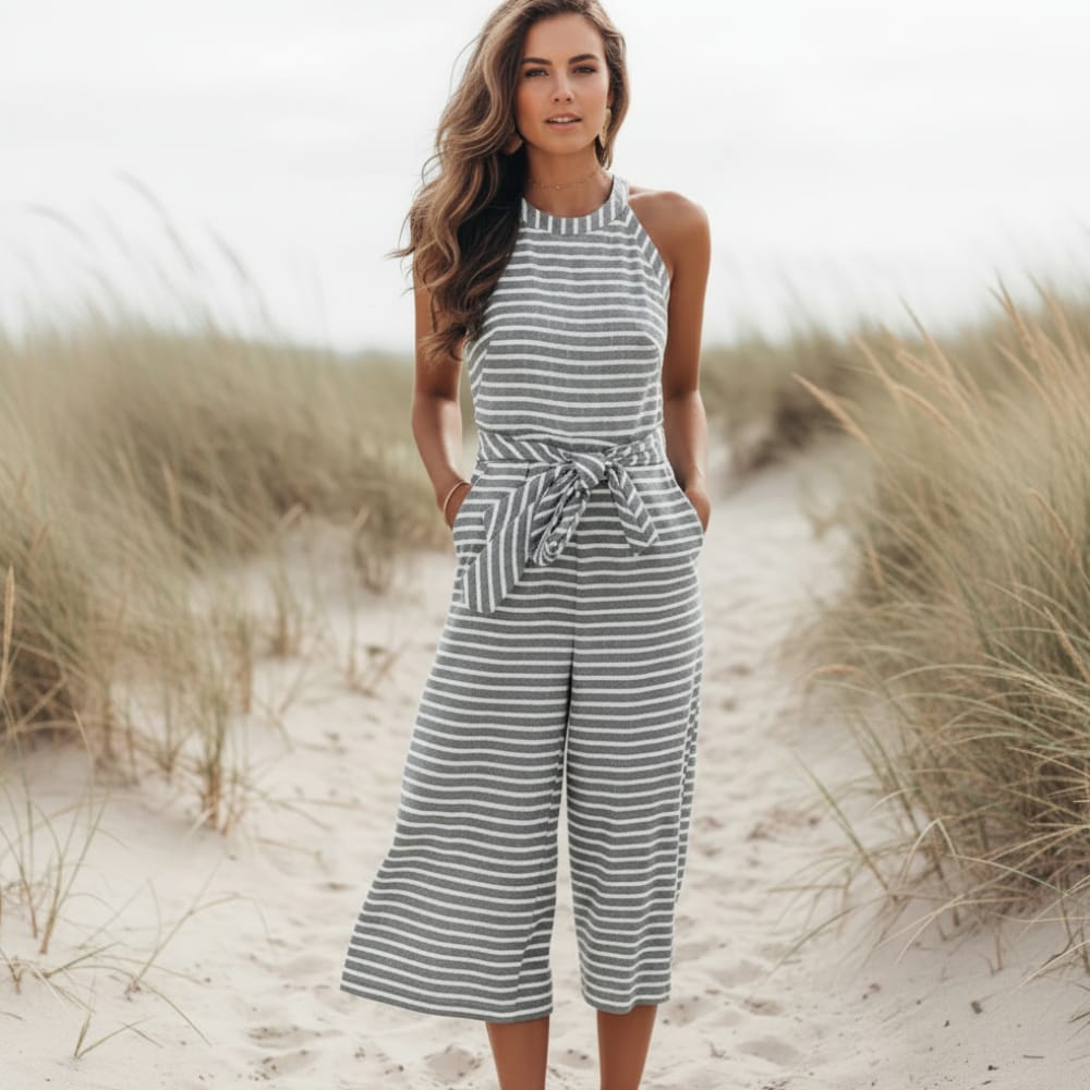Sleeveless striped linen jumpsuit with bow-tie waist and cropped wide-leg pants, blue-and-white