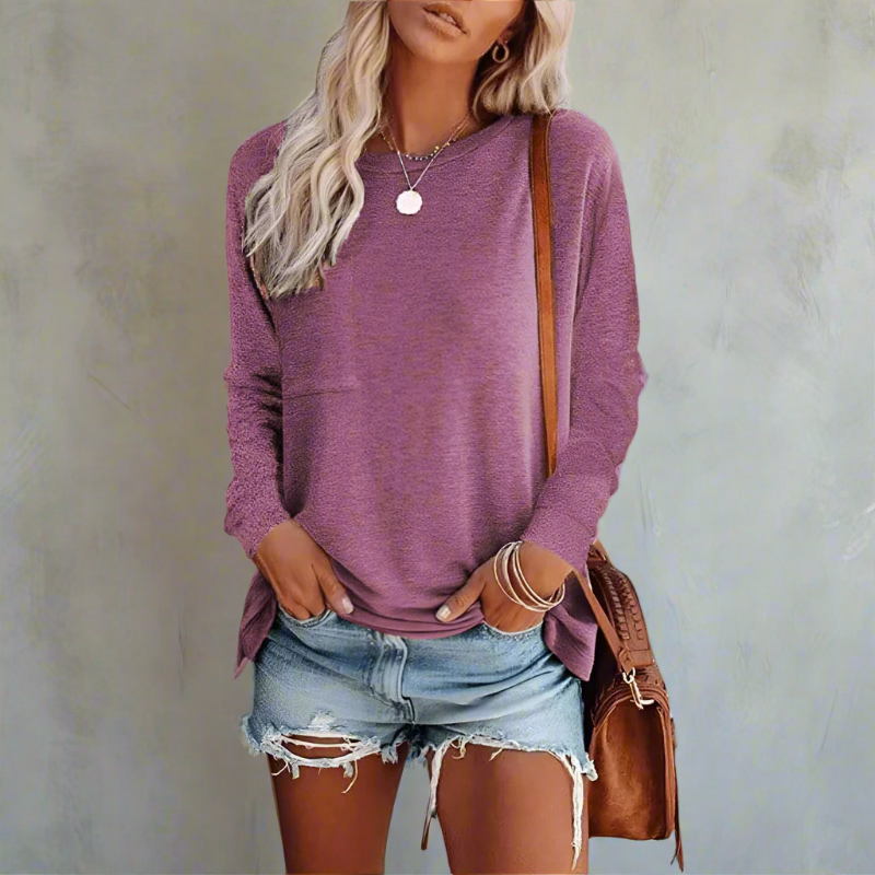 Women’s relaxed long-sleeve crew neck top in plum purple with chest pocket.