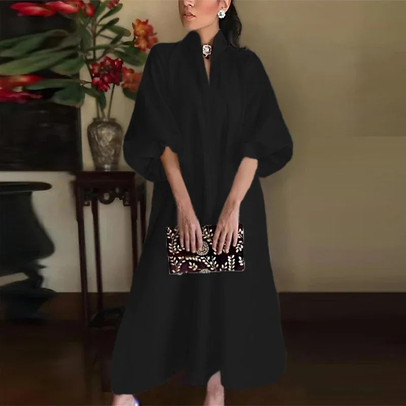 Black high-neck maxi dress with loose sleeves and keyhole neckline