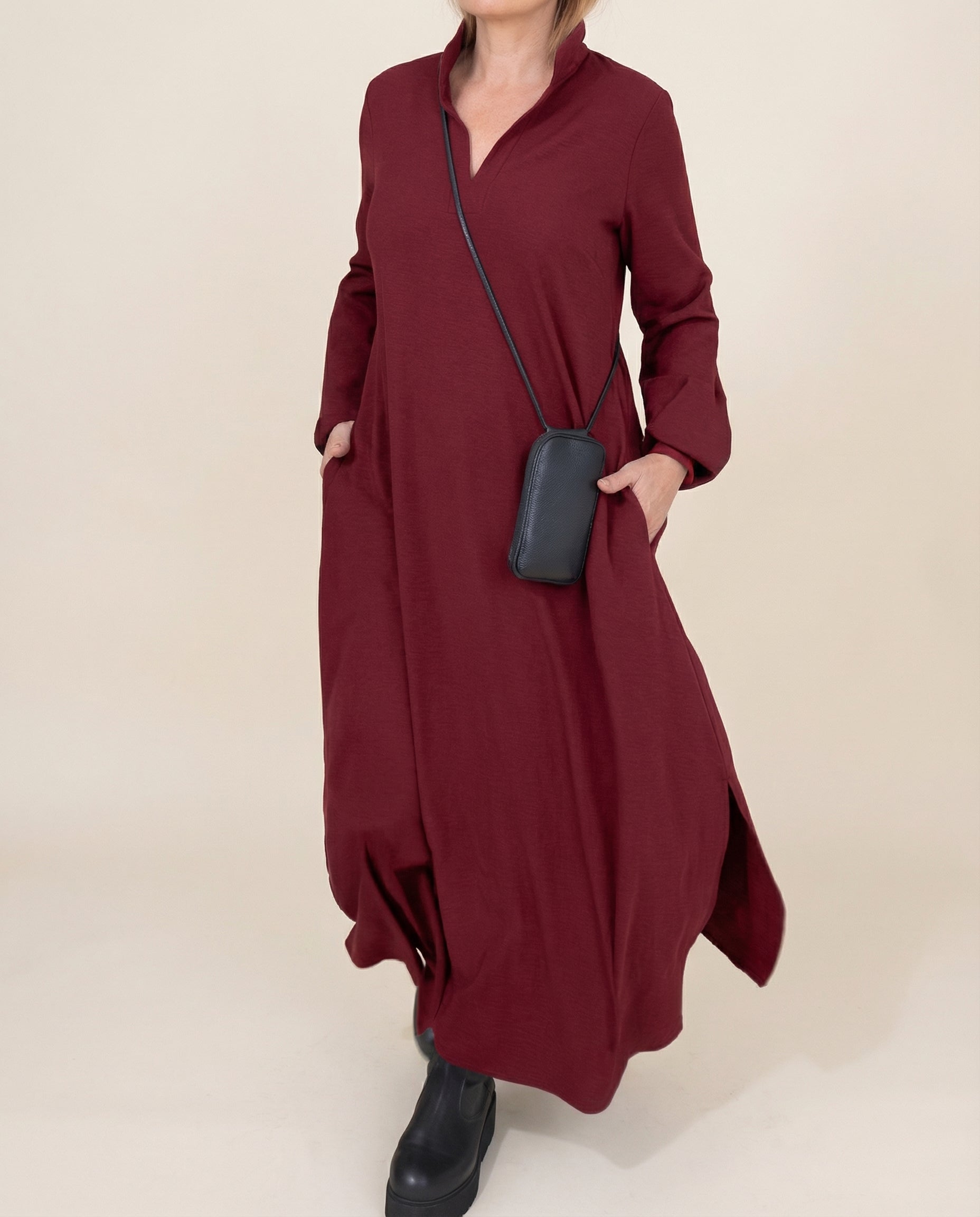 Burgundy long-sleeve maxi dress with stand collar and side pockets, loose fit