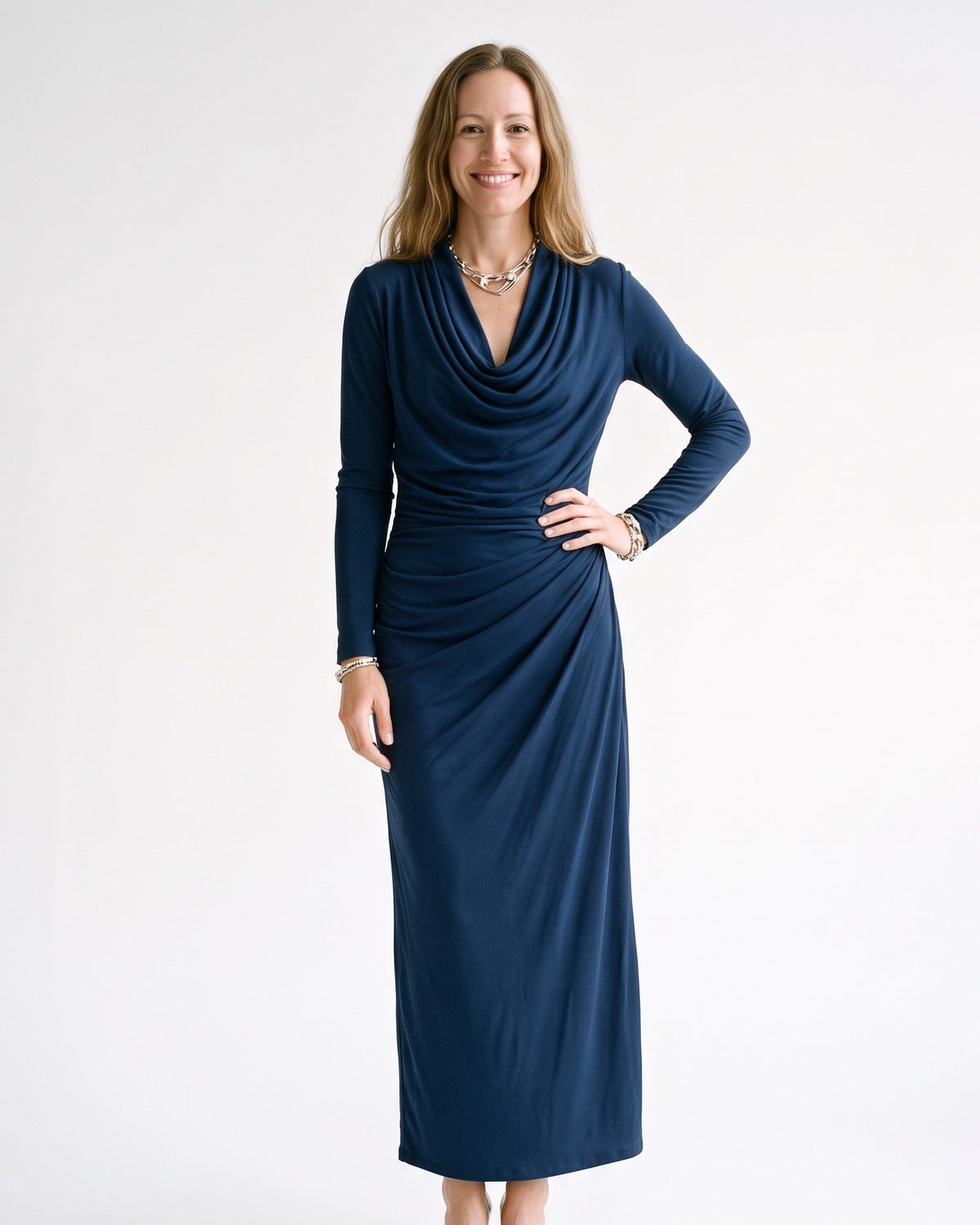 Dark blue long-sleeve maxi dress with draped cowl neck and ruched waist