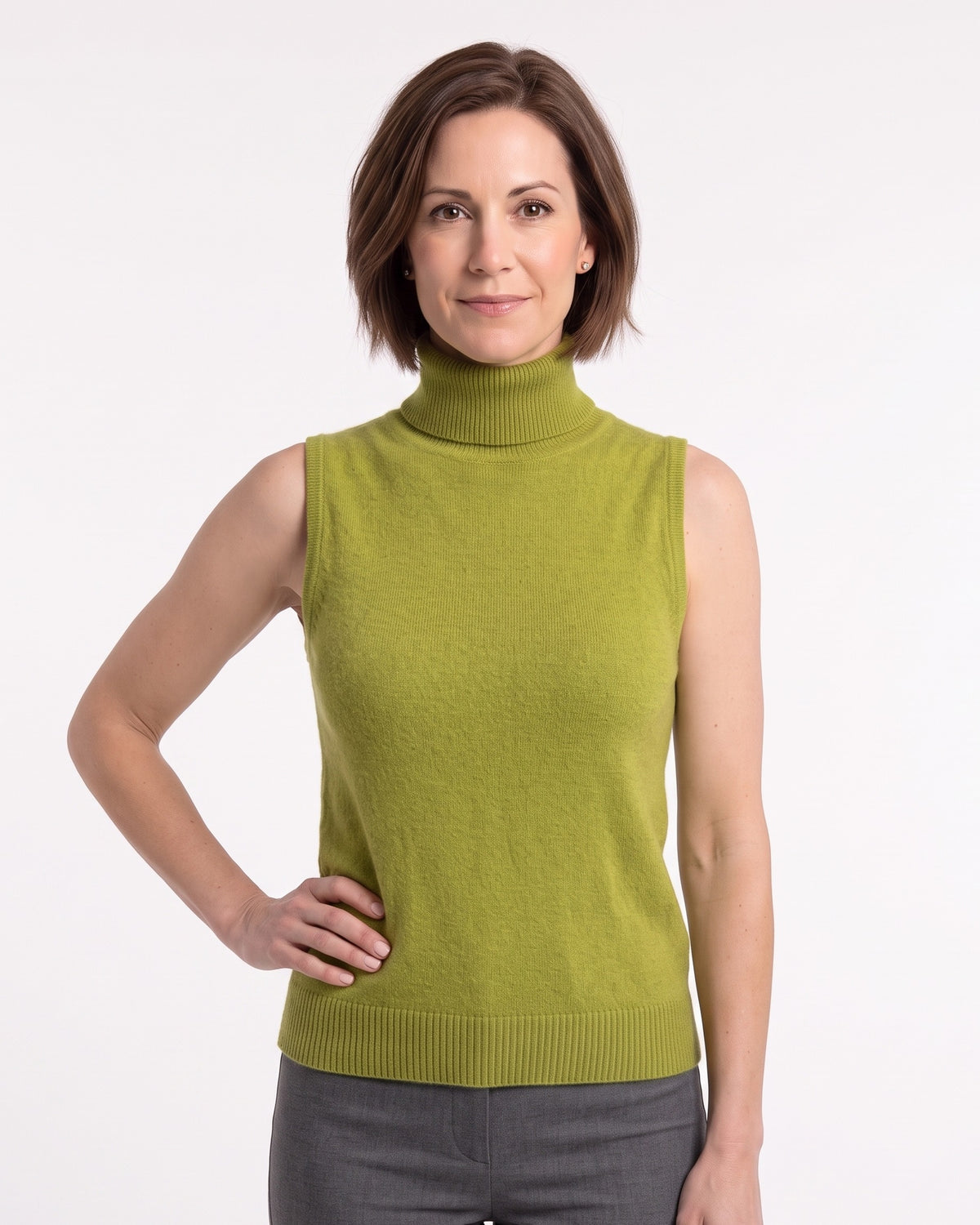 Green sleeveless knit turtleneck sweater with slim fit and ribbed hem