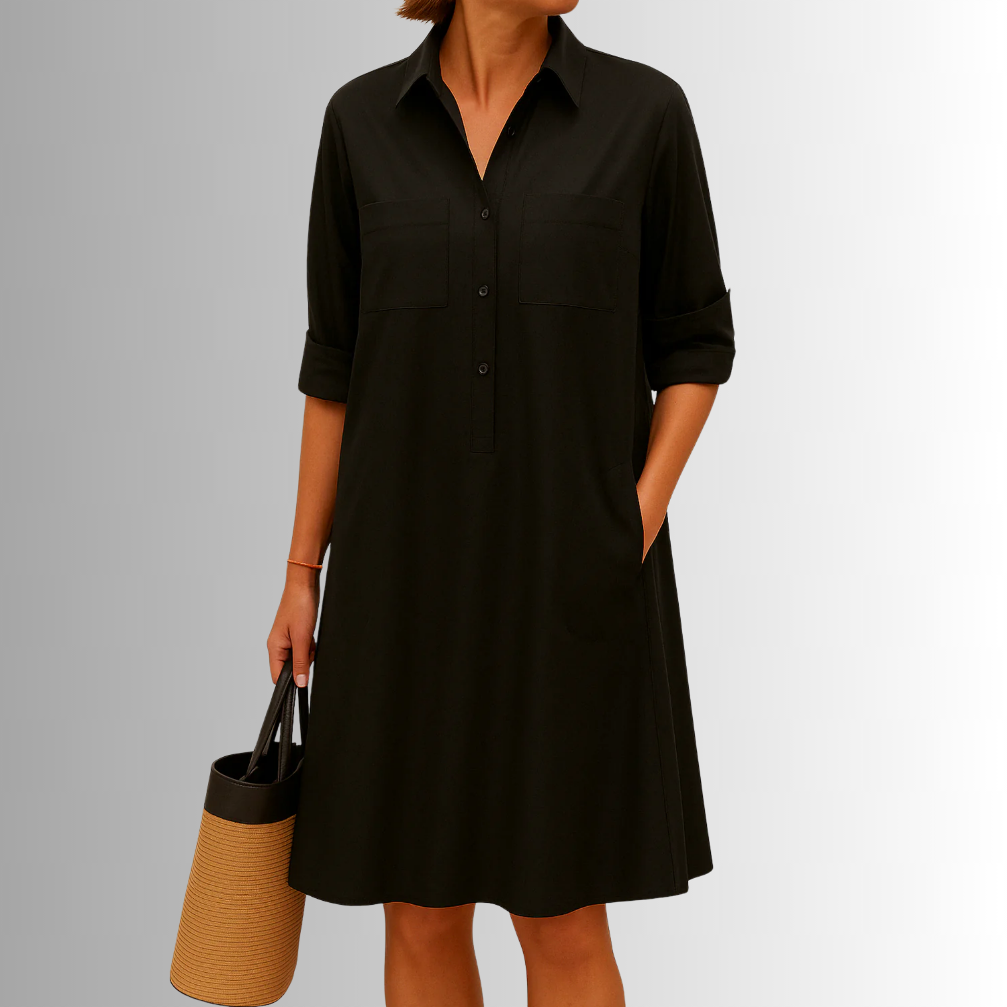 Black button-down A-line dress with collar, front buttons, and chest pockets.