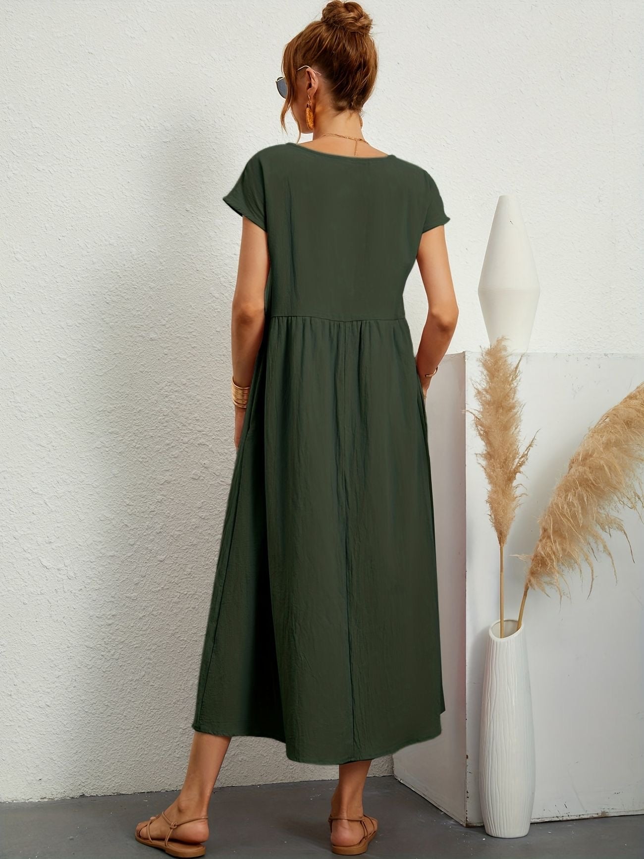 Olive green maxi dress, gathered waist and short sleeves, back view