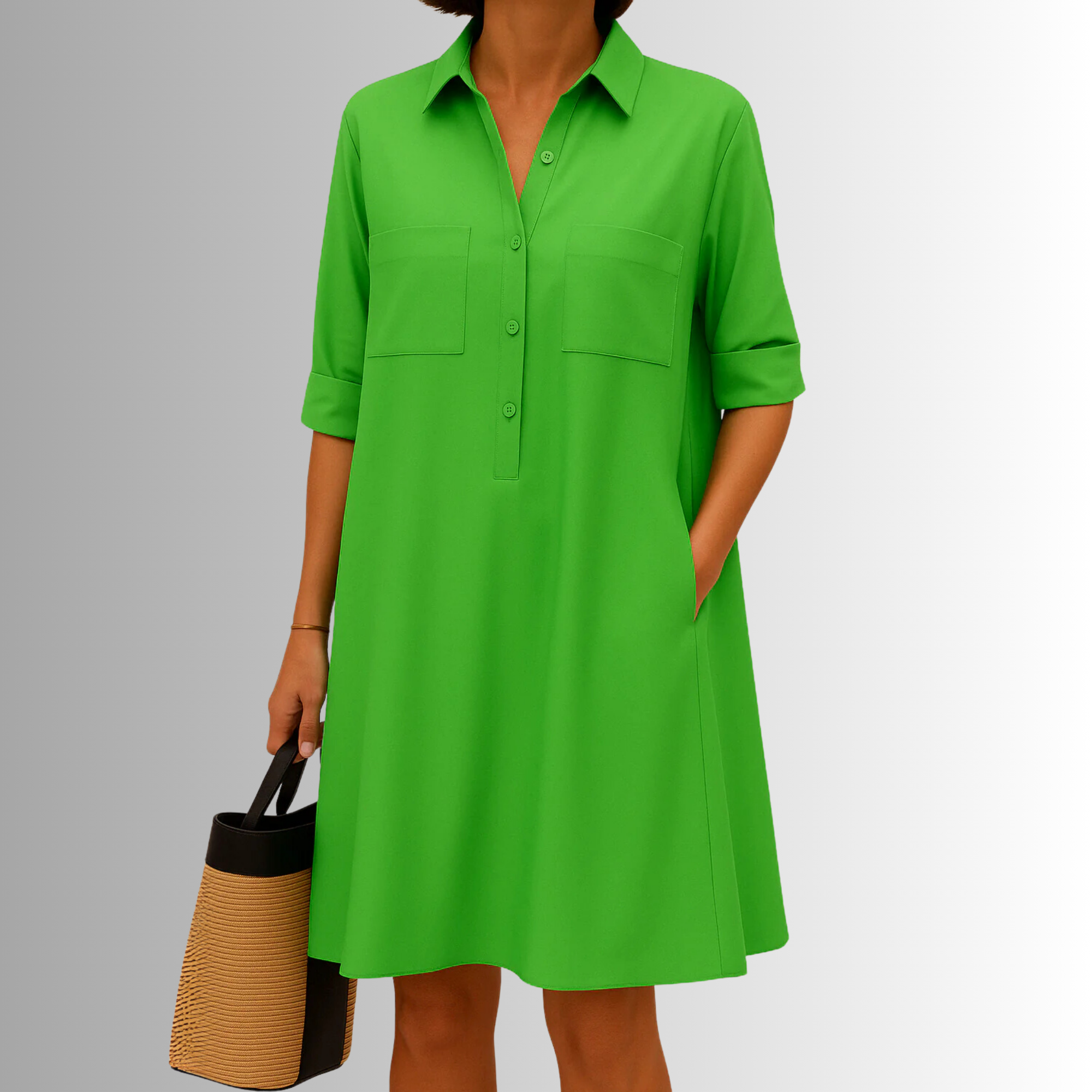 Green button-down A-line dress with collar, front buttons, and chest pockets.