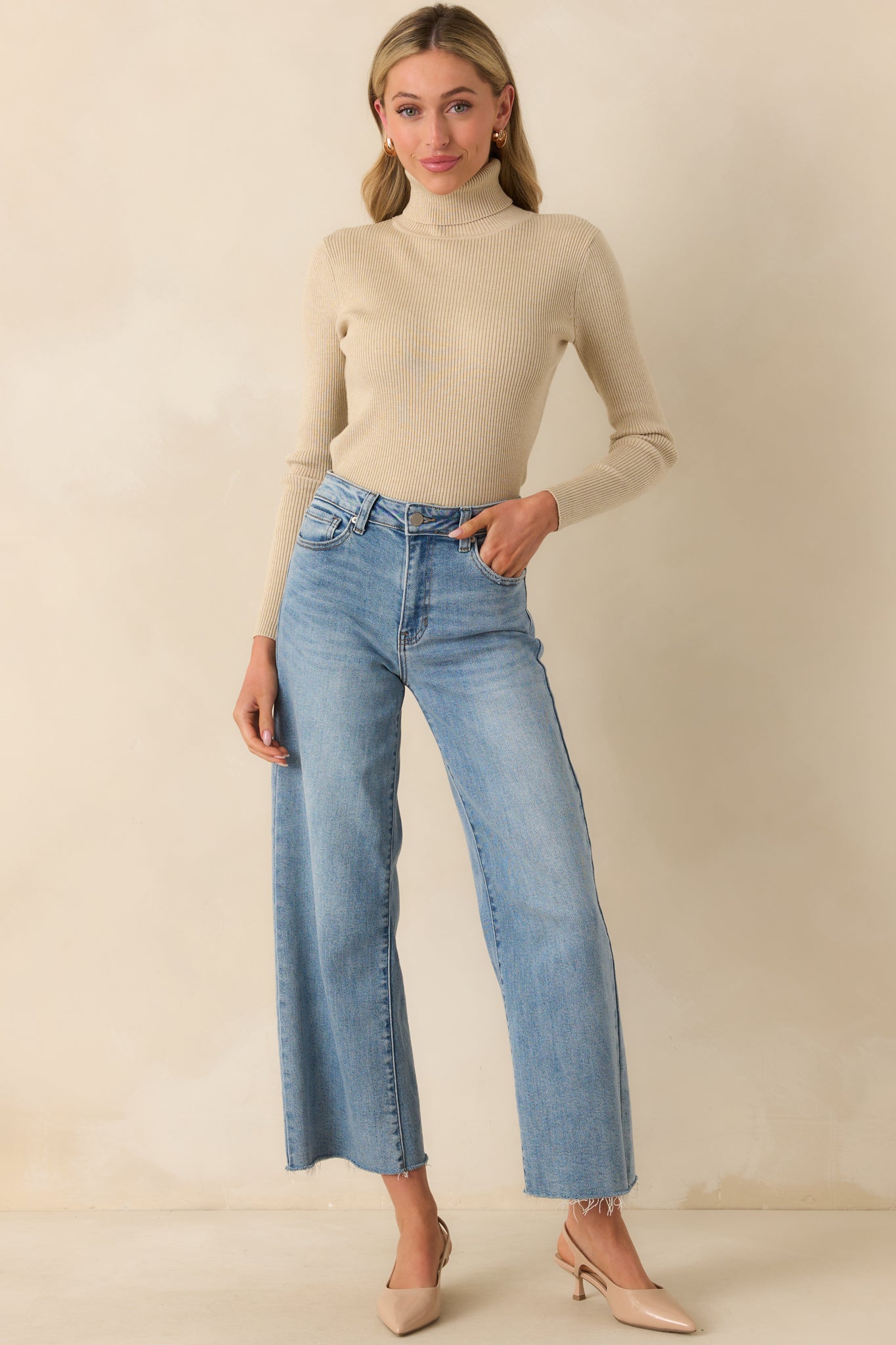 Beige ribbed long-sleeve turtleneck sweater with smooth fitted knit