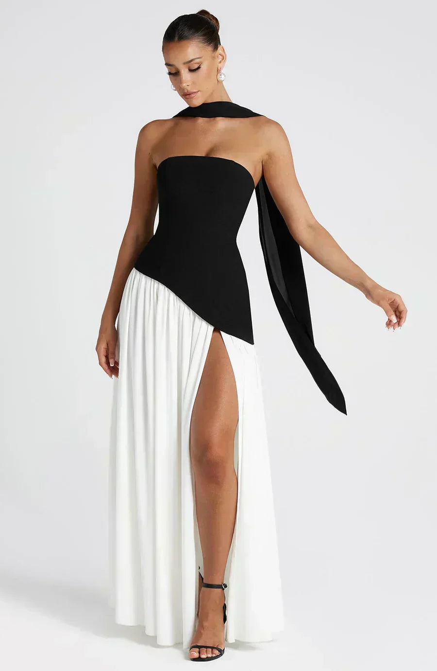 Black strapless maxi dress with open-back drape and high leg slit