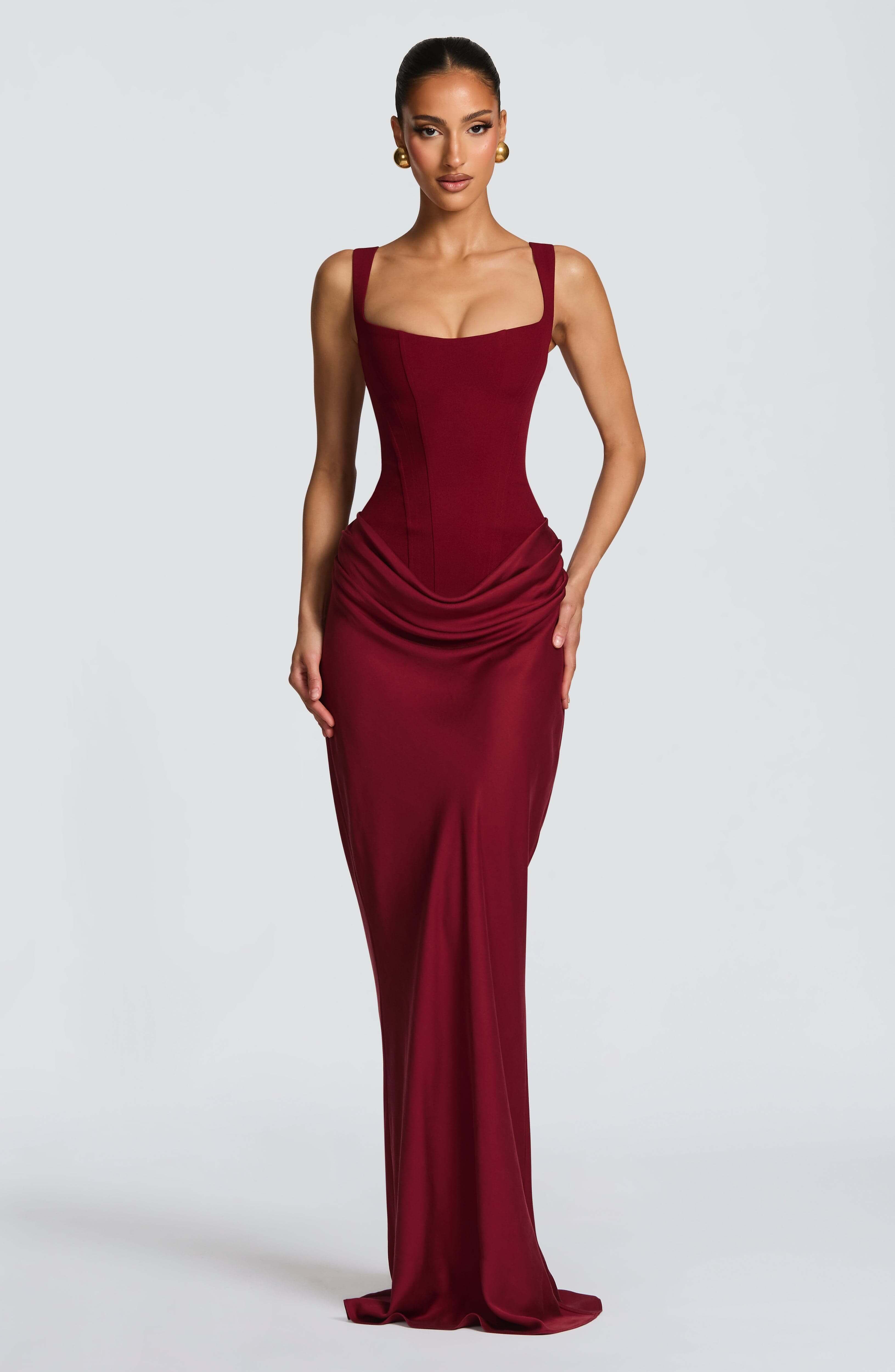 Burgundy sleeveless bodycon maxi dress with square neckline and draped waist